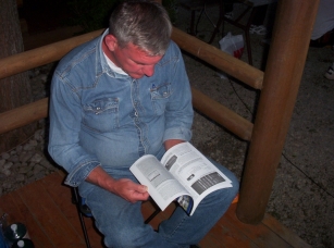 After a long day at Hamvention Terry KB9YXV relaxes outside cabin 501-B