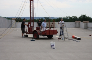 The MVARA portable tower is cranked up on the top level of the Onalaska, WI parking ramp