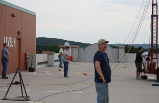 Dave WV9E supervises the setup on the top level of the Onalaska, WI parking ramp